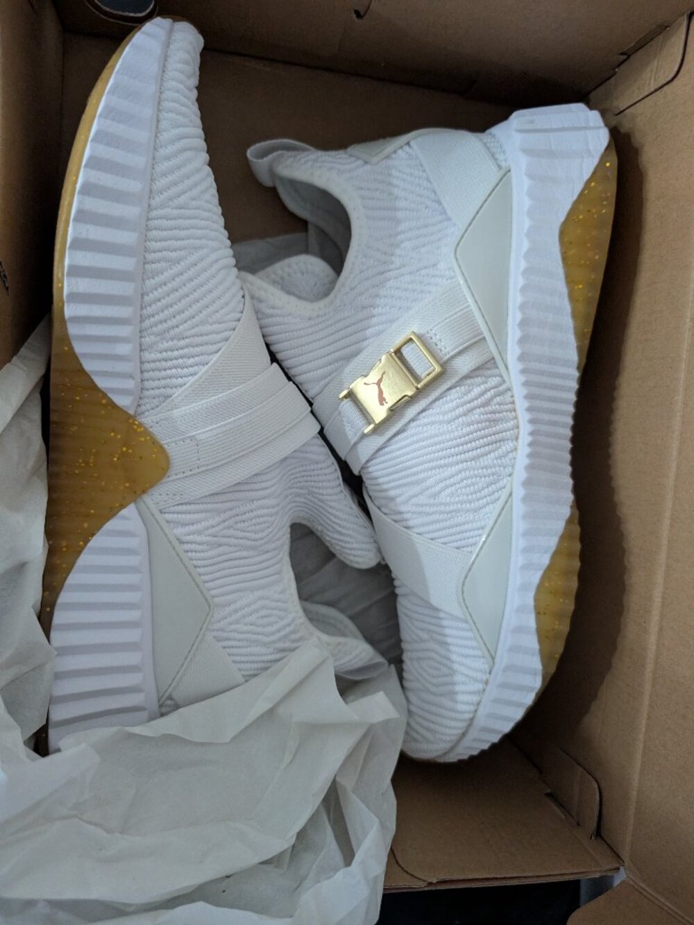 White Puma Brand running shoe